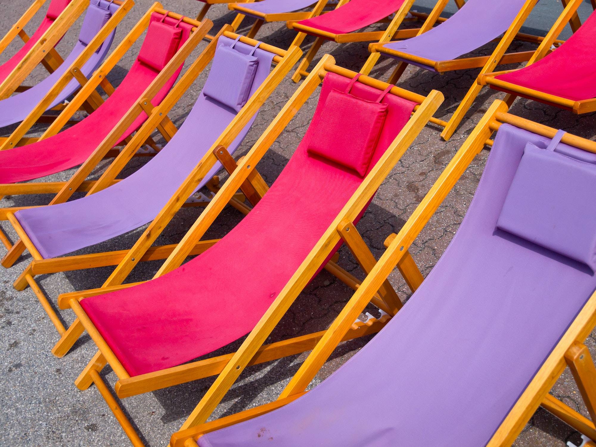 Colorful beach chairs background